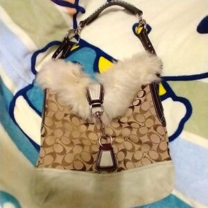 Coach monogram shoulder bag with faux fur